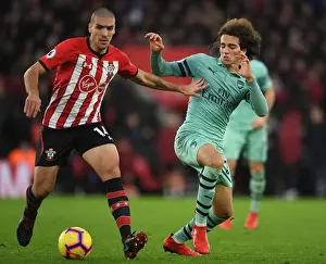 Southampton V Arsenal 2018-19 Prints: Guendouzi vs. Romeu: Intense Clash in Southampton v Arsenal Premier League Match