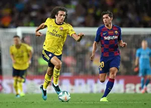 Guendouzi vs. Sergi Roberto: A Clash of Midfield Titans in FC Barcelona vs. Arsenal Pre-Season Clash at Nou Camp (2019)