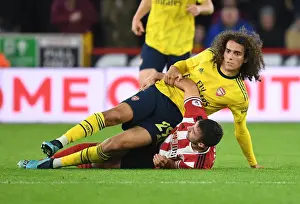 Guendouzi vs. Stevens: A Footballing Battle in Sheffield United vs. Arsenal Premier League Clash (2019-20)