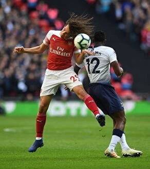 Tottenham Hotspur v Arsenal 2018-19 Collection: Guendouzi vs. Wanyama: Intense Battle in the Premier League Clash Between Arsenal and Tottenham