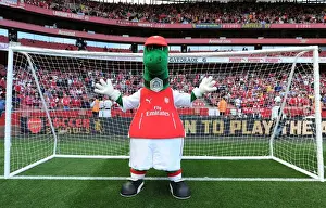 Gunnersaurus: Arsenal's Iconic Mascot in Action at Emirates Stadium