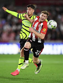Images Dated 27th September 2023: Havertz vs. Collins: Intense Battle for Possession in Arsenal's Carabao Cup Clash vs. Brentford