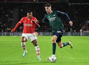 PSV Eindoven V Arsenal 2023-24 Prints: Havertz vs. Van Aanholt: A Champions League Showdown - Arsenal vs
