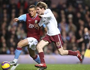 Images Dated 3rd December 2007: Head-to-Head: Hleb's Duel with Bouma in the Intense 1:2 Arsenal Victory over Aston Villa