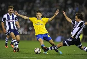 West Bromwich Albion v Arsenal 2013-14 - Capital Cup Collection: Hector Bellerin (Arsenal) James Morrison and Diego Lugano (WBA). West Bromwich Albion 1: 1 Arsenal