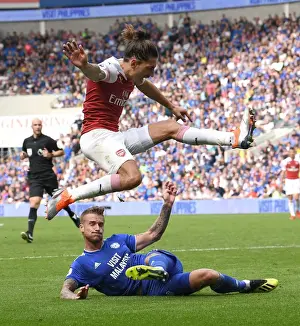 Cardiff City V Arsenal 2018-19 Prints: Hector Bellerin Leaps Over Joe Bennett: Intense Moment from Cardiff City vs Arsenal FC