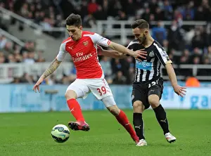 Newcastle United V Arseal 2014/15 Prints: Hector Bellerin's Escape: Outrunning Adam Armstrong in a Thrilling Arsenal Escape at Newcastle United