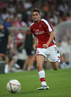 Burgenland XI V Arsenal Prints: Henri Lansbury in Action: Arsenal's Victory over Burgenland (2008)