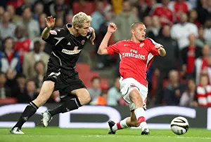 Henri Lansbury (Arsenal) Matthew Kilgallon (Shef Utd)