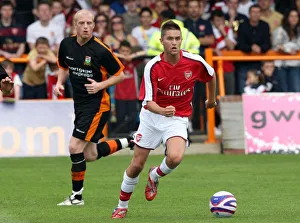 Henri Lansbury (Arsenal) Neal Bishop (Barnet)