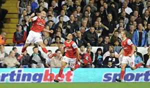 Henri Lansbury celebrates scoring the 1st Arsenal goal with Kieran Gibbs
