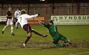 Images Dated 1st February 2008: Henri Lansbury scores his and Arsenals 1st goal past Daniel MacDonald (Burnley)