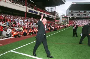 Henry Cooper (Former Boxer) walks onto the pitch for the Highbury Final Salute Ceremony