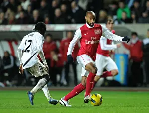 Swansea City V Arsenal 2011-12 Prints: Henry vs. Dyer: Intense Battle at Swansea's Liberty Stadium (Arsenal vs)
