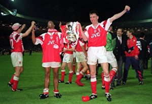 Images Dated 8th April 2005: Ian Wright and Andy Linighan, the scorer of the winning goal, celebrate with the FA Cup Trophy after
