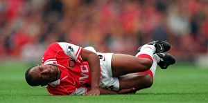 Ian Wright (Arsenal) on the floor injured