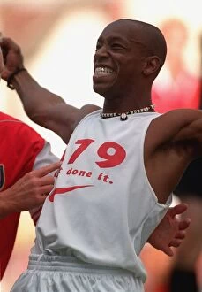 Images Dated 8th April 2005: Ian Wright celebrates breaking the Arsenal goalscoring record. Arsenal v Bolton