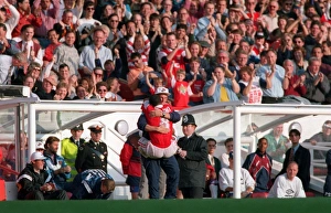 Ian Wright celebrates scoring for Arsenal