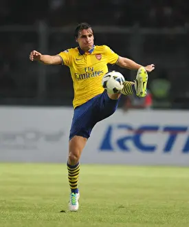Indonesia Dream Team V Arsenal 2013-14 Prints: Ignasi Miquel Faces Off Against Indonesia All-Stars in 2013-14 Pre-Season Match