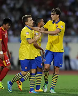 Vietnam V Arsenal 2013-14 Prints: Ignasi Miquel and Thomas Eisfeld Celebrate Goal for Arsenal against Vietnam (2013)