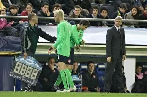 Images Dated 7th April 2009: Injured Arsenal goalkeeper Manuel Almunia is replaced