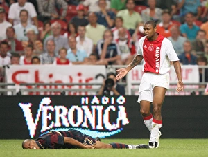Ajax V Arsenal 2007-8 Prints: Injured Gael Clichy (Arsenal) and Ajax defender Colin