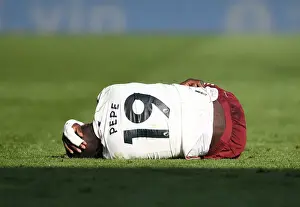 Injured Pepe: Arsenal's Struggle at Leicester Amidst Empty Stands (2020-21)