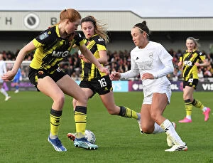Images Dated 14th January 2024: Intense Battle: Arsenal Women vs. Watford Women in FA Cup Fourth Round
