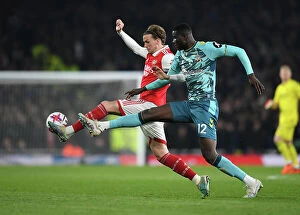 Images Dated 22nd April 2023: Intense Battle for Ball Possession: Arsenal vs. Southampton in Premier League Showdown