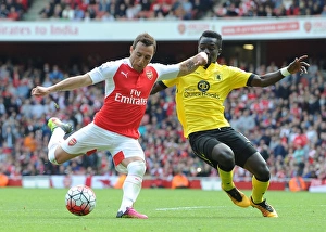 Arsenal V Aston Villa 2015-16 Prints: Intense Battle: Cazorla vs. Gana - Arsenal vs. Aston Villa, 2015-16 Premier League