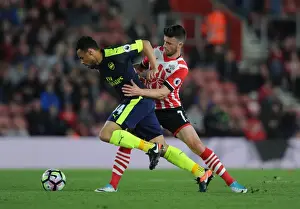 Intense Battle: Coquelin vs Long - Premier League Showdown