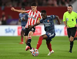 Brentford V Arsenal 2021-22 Prints: Intense Battle: Flo Balogun vs Christian Norgaard - Premier League Clash between Arsenal and Brentford