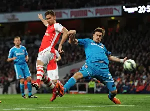 Intense Battle: Giroud vs. Coates at Arsenal's Emirates Stadium - A Premier League Showdown (2014-15)