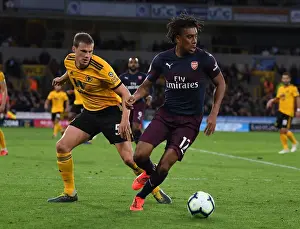 Intense Battle: Iwobi vs Bennett - Arsenal's Premier League Showdown vs Wolverhampton Wanderers (2018-19)