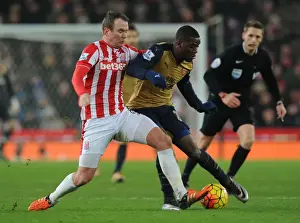 Stoke City V Arsenal 2015-16 Prints: Intense Battle: Joel Campbell vs Glenn Whelan at Stoke City vs Arsenal (2015-16)