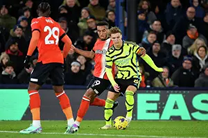 Intense Battle: Martin Odegaard Faces Off Against Jacob Brown in Luton Town vs Arsenal FC, Premier League 2023-24