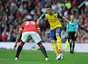 Manchester United V Arsenal 2014-15 Prints: Intense Battle: Mesut Ozil vs. Antonio Valencia (Manchester United vs. Arsenal, 2014-15)