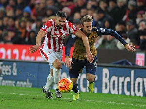 Stoke City V Arsenal 2015-16 Prints: Intense Battle: Nacho Monreal vs