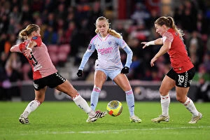 Images Dated 23rd November 2023: Intense Battle for Possession: Arsenal vs. Southampton - FA Women's Continental Tyres League Cup