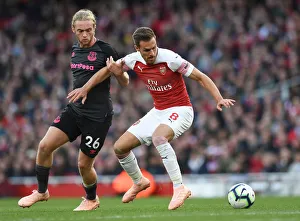 Arsenal V Everton 2018-19 Prints: Intense Battle: Ramsey vs. Davies - Arsenal vs. Everton, Premier League 2018-19