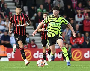 AFC Bournemouth V Arsenal 2023-24 Prints: Intense Battle: Rice vs. Solanke in Arsenal's Premier League Showdown against AFC Bournemouth (2023-24)