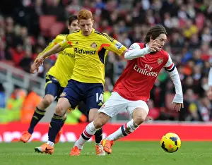 Arsenal V Sunderland 2013-14 Prints: Intense Battle: Rosicky vs. Colback - A Premier League Showdown