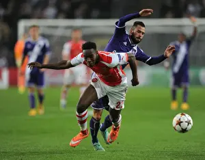 Anderlecht V Arsenal 2014-15 Prints: Intense Battle: Welbeck vs. Defour - Arsenal's UEFA Champions League Showdown