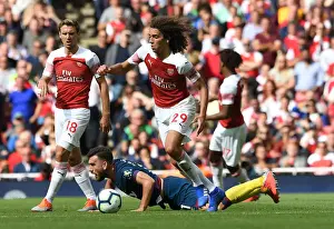 Arsenal V West Ham United 2018-19 Prints: Intense Clash: Guendouzi vs. Snodgrass in Premier League Showdown