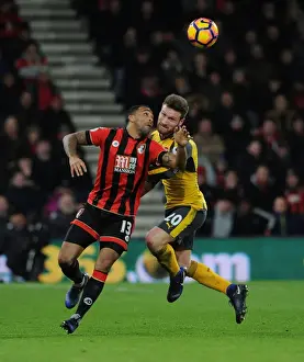 AFC Bournemouth V Arsenal 2016-17 Prints: Intense Clash: Mustafi vs Wilson - Arsenal vs Bournemouth, Premier League (January 2017)