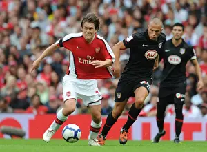 Arsenal V Athletico Madrid 2009-10 Prints: Intense Clash: Rosicky vs. Heitinga in the 2009 Emirates Cup