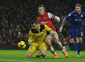 Arsenal V Cardiff City 2013-14 Prints: Intense Clash: Wilshere vs. Marshall - Arsenal's Premier League Battle