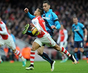 Arsenal V Stoke City 2014-15 Prints: Intense Face-Off: Alexis Sanchez vs. Geoff Cameron - Arsenal's Premier League Battle