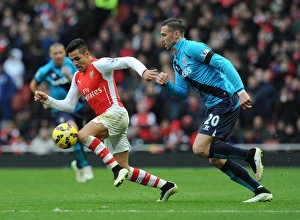 Arsenal V Stoke City 2014-15 Prints: Intense Face-Off: Alexis Sanchez vs