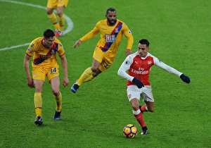 Arsenal V Crystal Palace 2016-17 Prints: Intense Face-off: Alexis Sanchez vs